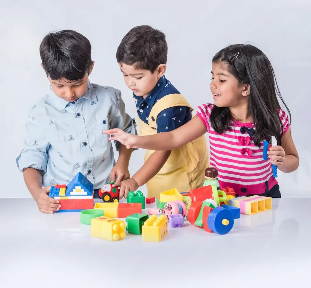imgi_1_cute-little-indian-asian-kids-playing-with-toys-blocks-having-fun-whi